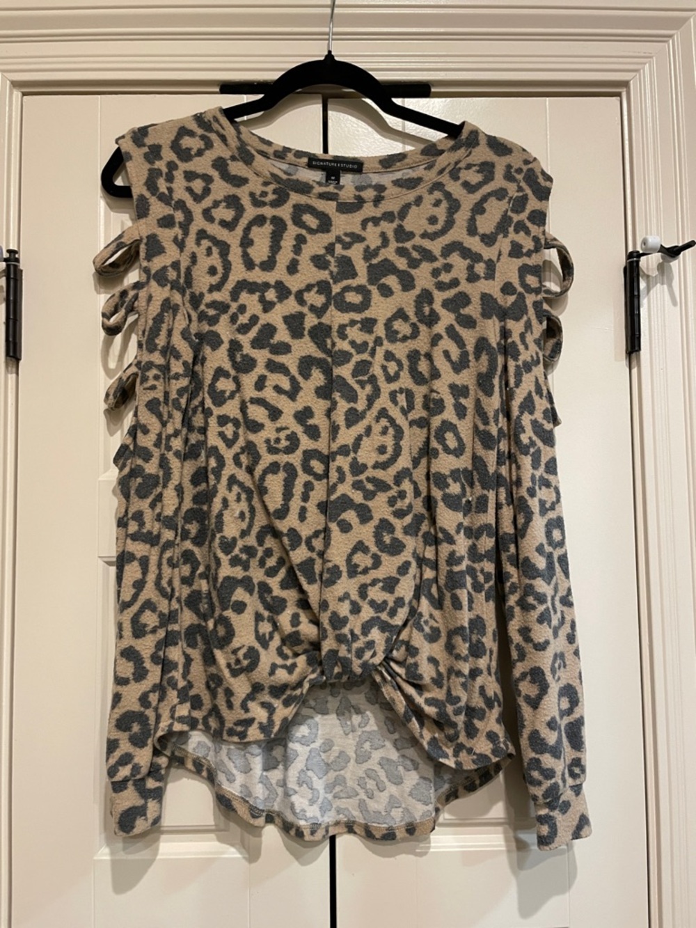 Leopard Print Sleeveless Top with open arms